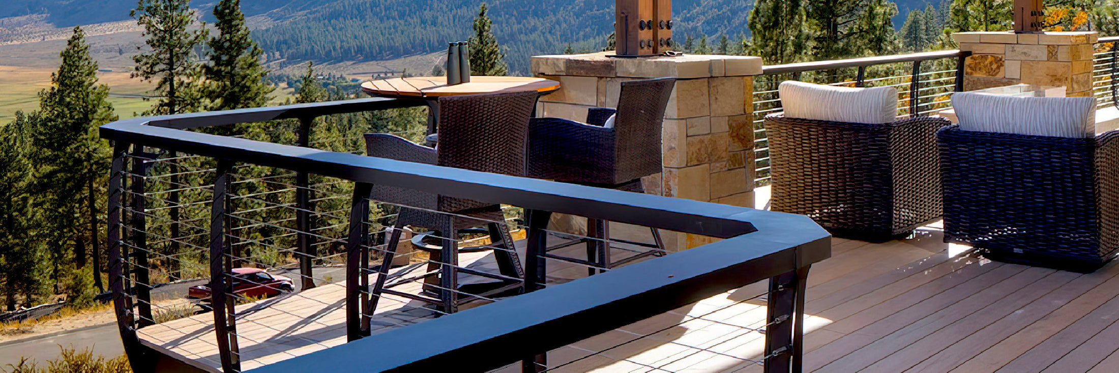 Cable railing wrapping around the corners of an outdoor deck